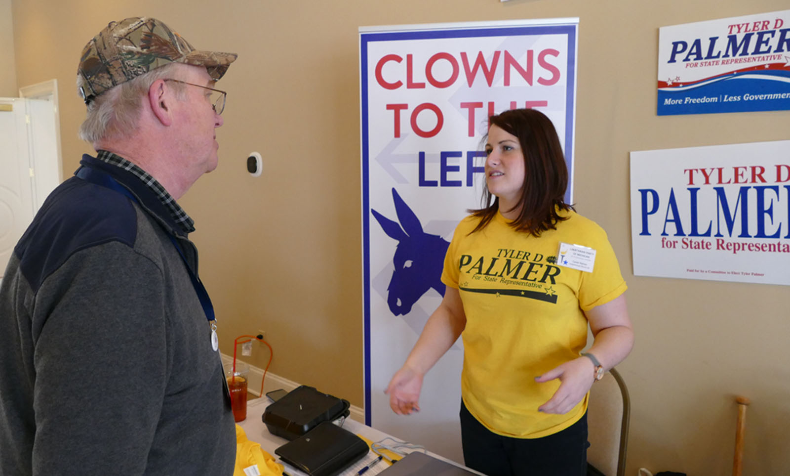 Casidi Palmer Talks to Convention Atttendee While Campaigning for Libertarian Primary Candidate Tyler Palmer.