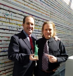 Kevin Dietz accepting Spokesperson for Liberty award from Scotty Boman. Photo by Linda Moore.