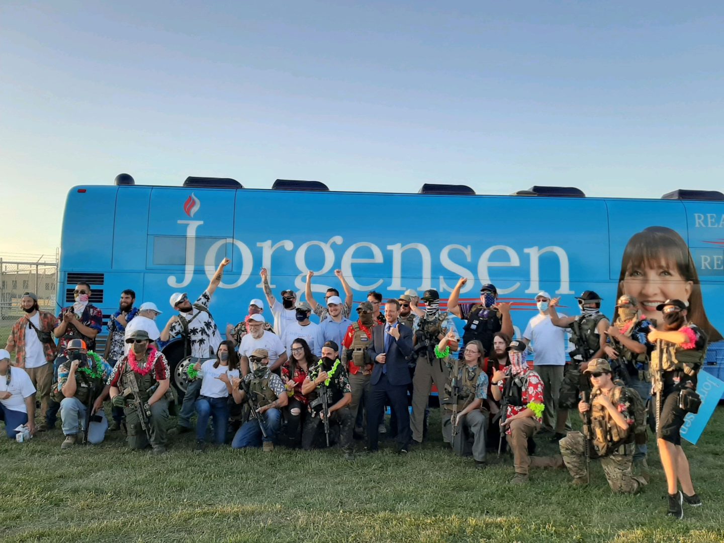 Spike Cohen supporters gather in front of the tour bus for a group photo. Photo by Shane Allen.