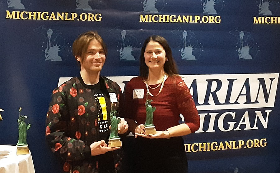 Unity Caucus Libby Awards with Promoter Ryan Brennan and Spokesperson Leah Daily. Bradley Hunt's Libby is on the table to the left.